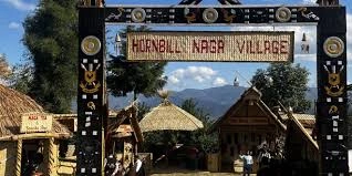 Entrance to Hornbill Naga Village with traditional tribal architecture and cultural motifs